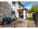 A spacious backyard with a covered patio, gravel, green turf, and privacy fence at 22787 W Gardenia Dr, Buckeye, AZ 85326