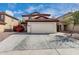 Charming two-story home featuring a red tile roof and spacious two-car garage at 22787 W Gardenia Dr, Buckeye, AZ 85326