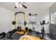 Home gym featuring exercise equipment and a fan. Perfect for workout enthusiasts! at 22787 W Gardenia Dr, Buckeye, AZ 85326