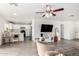 Open-concept living area showcases modern floors, neutral colors, and abundant natural light at 22787 W Gardenia Dr, Buckeye, AZ 85326
