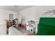 Charming playroom with play kitchen, decorative wall decals, carpeted floors and playful decor at 22787 W Gardenia Dr, Buckeye, AZ 85326