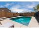 Backyard pool with patio and mature trees at 22787 W Gardenia Dr, Buckeye, AZ 85326
