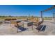 Cozy outdoor firepit area with comfortable seating, perfect for relaxing and enjoying the outdoors at 23020 E Excelsior Ave, Queen Creek, AZ 85142