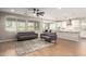 Open concept living area with bright, natural light and tile floors at 23020 E Excelsior Ave, Queen Creek, AZ 85142