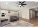 Open-concept living area with easy access to kitchen and stainless appliances at 23020 E Excelsior Ave, Queen Creek, AZ 85142