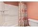 Full bath featuring a shower with white tub, and a patterned shower curtain at 26011 W Tonopah Dr, Buckeye, AZ 85396