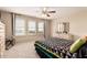 Bedroom featuring large windows and a cozy seating area with natural light at 26011 W Tonopah Dr, Buckeye, AZ 85396