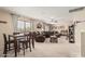 Large bonus room with multiple seating areas and natural light at 26011 W Tonopah Dr, Buckeye, AZ 85396