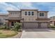 Spacious two-story home with a three-car garage and stucco exterior at 26011 W Tonopah Dr, Buckeye, AZ 85396