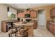 Updated kitchen with granite countertops, cabinets, and a kitchen island at 26011 W Tonopah Dr, Buckeye, AZ 85396