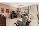 Inviting living room featuring contemporary furniture, TV, and neutral tones at 26011 W Tonopah Dr, Buckeye, AZ 85396