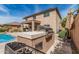 Outdoor kitchen area featuring a built-in grill, perfect for hosting barbecues and enjoying outdoor meals at 26011 W Tonopah Dr, Buckeye, AZ 85396