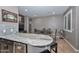 Dining room with granite countertop bar and wine cooler at 27173 N 86Th Ave, Peoria, AZ 85383