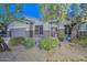 Charming single-story home with beautiful landscaping and a welcoming front entrance at 27173 N 86Th Ave, Peoria, AZ 85383
