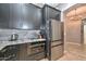Modern kitchen with stainless steel refrigerator and built in microwave at 27173 N 86Th Ave, Peoria, AZ 85383
