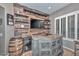 Stylish living room with custom-built shelves, modern lighting, and comfortable seating, perfect for entertaining at 27173 N 86Th Ave, Peoria, AZ 85383