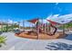 Community playground featuring shade and slides, and picnic seating at 27173 N 86Th Ave, Peoria, AZ 85383