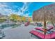 Backyard pool with lounge chairs and a beautiful mountain view at 27173 N 86Th Ave, Peoria, AZ 85383