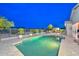 Backyard pool and lounge area with view of desert landscape and mountain range at 27173 N 86Th Ave, Peoria, AZ 85383