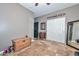 Spare room with a chest, décor, and tiled floors at 27173 N 86Th Ave, Peoria, AZ 85383