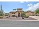 Charming single-story home featuring desert landscaping, a tiled roof, and an attached two car garage at 2862 N 156Th Dr, Goodyear, AZ 85395