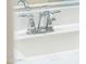 Close-up of a bathroom sink featuring a stylish chrome faucet and clean, bright countertop at 31096 N 133Rd Ave, Peoria, AZ 85383