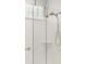 Modern shower features glass door, tiled walls, and a sleek showerhead, offering a spa-like experience at 31096 N 133Rd Ave, Peoria, AZ 85383
