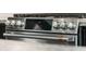 Close-up of a stainless steel stove with digital display and chrome knobs in modern kitchen at 31096 N 133Rd Ave, Peoria, AZ 85383
