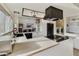 Bright modern kitchen with white subway tile, modern appliances, and an adjacent laundry area for added convenience at 3324 S Juniper St, Tempe, AZ 85282