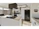 Bright kitchen featuring white cabinets, stainless-steel appliances, and a subway tile backsplash creates a modern, clean aesthetic at 3324 S Juniper St, Tempe, AZ 85282