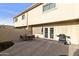 Inviting patio area with dining set and grill, ideal for outdoor gatherings and relaxation at 3324 S Juniper St, Tempe, AZ 85282