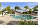 Community pool with lounge chairs and umbrellas, offering a relaxing and enjoyable outdoor space for residents at 3324 S Juniper St, Tempe, AZ 85282