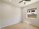 Bedroom featuring neutral walls, wood floors, and natural light at 4817 E Cielo Grande Ave, Phoenix, AZ 85054