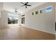 Bright, spacious living area with multiple windows providing ample natural light and desert landscape views at 4817 E Cielo Grande Ave, Phoenix, AZ 85054