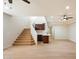Open living area featuring a staircase, wet bar, and natural light filled interior at 4817 E Cielo Grande Ave, Phoenix, AZ 85054