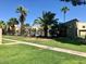 Well-maintained lawn and landscaping add to the charm of this community with a shared pool at 4828 W Rancho Dr, Glendale, AZ 85301
