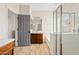 Bathroom featuring a walk-in shower, soaking tub, and a vanity with double sinks at 5320 W Fawn Dr, Laveen, AZ 85339