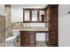 The bathroom showcases a vanity with ample cabinet storage and a well-lit mirror at 5358 S Farmer Ave, Tempe, AZ 85283