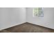 This bedroom features a window providing natural light and carpeted floors at 5358 S Farmer Ave, Tempe, AZ 85283