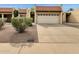 Charming single-story home featuring a red tile roof, a two-car garage, and desert landscaping at 5358 S Farmer Ave, Tempe, AZ 85283