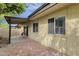 Rear patio with brick accents and a sliding door leading inside the house at 5358 S Farmer Ave, Tempe, AZ 85283