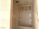 Unfinished bathroom features a new white bathtub and shower combination at 5551 S 240Th Ln, Buckeye, AZ 85326