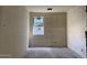 Unfinished bedroom featuring a window with view, awaiting personalization and finishing touches at 5551 S 240Th Ln, Buckeye, AZ 85326