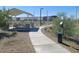 Well-maintained walkway with a pet waste station and covered picnic area, great for dog owners at 5551 S 240Th Ln, Buckeye, AZ 85326
