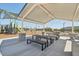 Covered picnic area with multiple tables and benches, ideal for outdoor gatherings and Gathering outings at 5551 S 240Th Ln, Buckeye, AZ 85326
