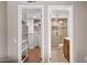 Hallway with doors to the bathroom and closet at 5632 S Hurricane Ct # C, Tempe, AZ 85283