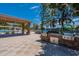 Community outdoor grilling area features stone counter, built-in gas grills, and covered seating at 5632 S Hurricane Ct # C, Tempe, AZ 85283