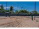 Community sand volleyball court with a net in a sunny outdoor area at 5632 S Hurricane Ct # C, Tempe, AZ 85283