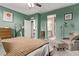 Charming bedroom showing an en-suite bathroom, a full-length mirror, and plenty of character at 6413 S 47Th Dr, Laveen, AZ 85339