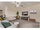 Comfortable living room with neutral-toned walls, plush carpet, and stylish furnishings at 6413 S 47Th Dr, Laveen, AZ 85339
